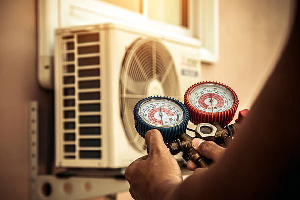 Professional Ac Installation technician working in Moulton, AL